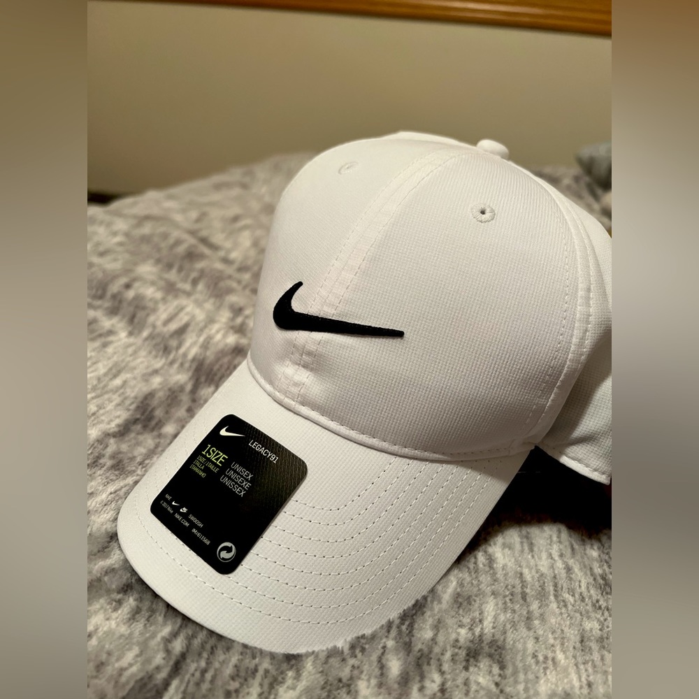 COPY - white, nike baseball cap. material is 100% polyester.